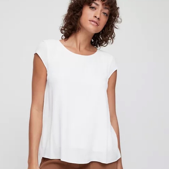 Babaton Tops - Aritzia Babaton Juliger Blouse White cap sleeve with tie back. Size small.